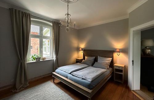 Hintersee Apartment | Landhaus hinter`m See Ferienwohnung Landliebe luxuriöser Wintergarten Kachelöfen