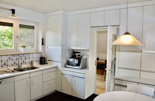 Rustersiel House | Large holiday home on the dike with a winter garden, garden and terrace