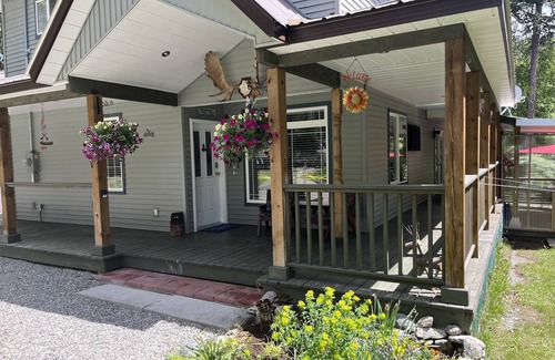 Kootenay Boundary House | Large Lakefront Home w Private Dock & picturesque Mountain Views on Jewel Lake!