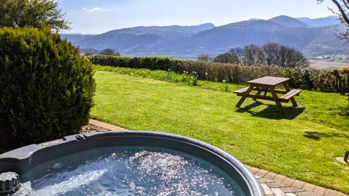 Eglwysbach House | Laurel - pet-friendly cottage with indoor pool, hot tub & panoramic Snowdonia views