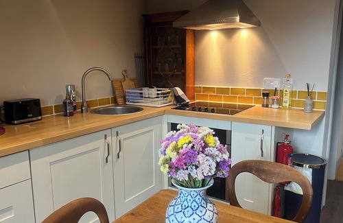 Wicklewood Cabin | Lavender Lodge - Pool and Hot Tub with sunset views over open fields & Fast WiFi
