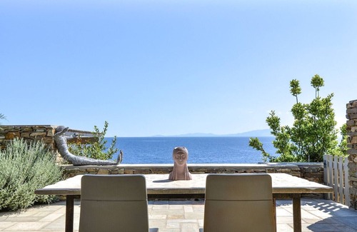 Agios Romanos Villa | Lavish Tinos See Front Villa | Villa Areti | 2 Bedrooms | Breathtaking Sea Views | Private Furnished Terrace with Shaded Outdoor Dining Area | Pet Friendly | Shared Outdoor Pool | Prime Location | Agios Romanos