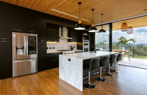 El Penol Villa | Legacy Colombia: Modern Waterfront Luxury + Tennis