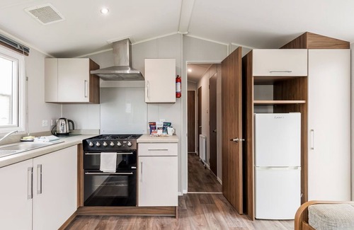 Hamworthy House | Licence to Chill - a caravan that sleeps 6 guests in 3 bedrooms