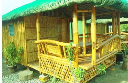 Bacnotan Cottage | Local style cottage in a garden setting - cosy comfort with A/C