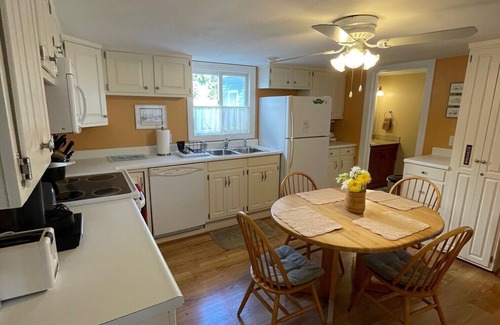 Yachting Village Apartment | LOCATION! Downtown, 2BR, Full Kitchen, Patio, off-street parking for two cars!