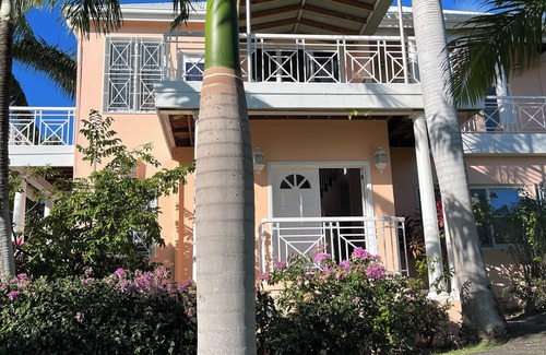 Jessups Village House | Location, Location, Location Pinney’s Beach Nevis. 2 Bdrs, 2 1/2 Ba. w laundry!