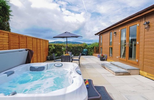 Low Newton Ski Chalet | Lodge with one king-size double with TV.