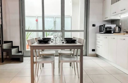 Santa Rita Apartment | Loft Design + Garage and Fitness Area