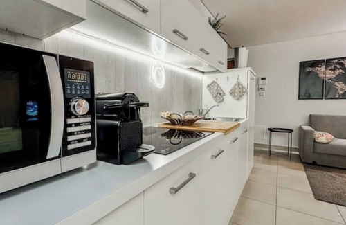 Santa Rita Apartment | Loft Design + Garage and Fitness Area