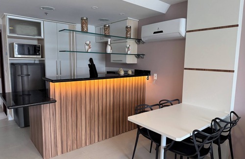 Praia Grande Apartment | Loft with sea view.