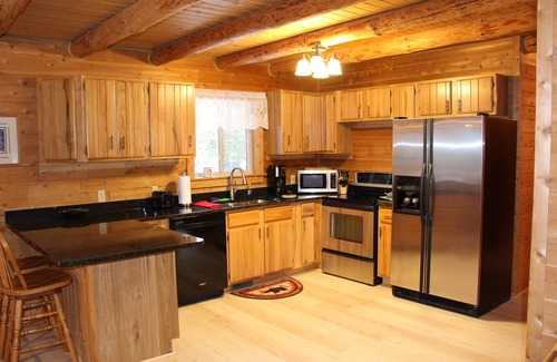 Indian River Cabin | Log Cabin home on the Sturgeon River in Indian River