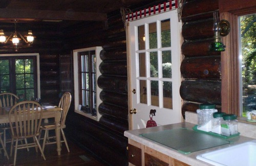 Marmot Cabin | Log cabin, private, hottub, sauna, spa, gardens, featured in national magazine.