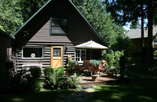 Marmot Cabin | Log cabin, private, hottub, sauna, spa, gardens, featured in national magazine.