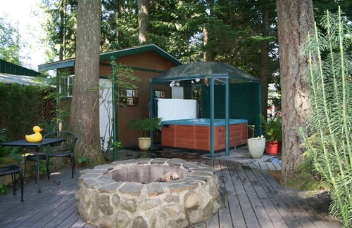 Marmot Cabin | Log cabin, private, hottub, sauna, spa, gardens, featured in national magazine.
