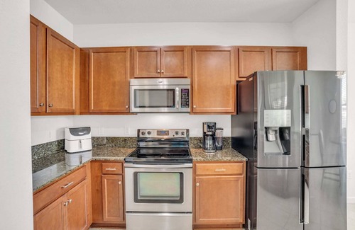 Bonita Springs Condo | Long Lake View From This First Floor Coach Home
