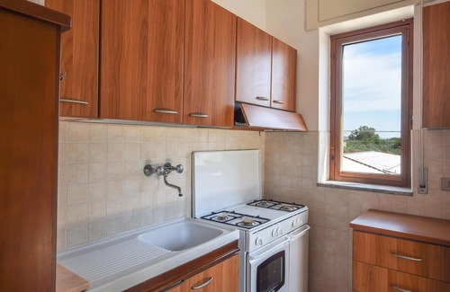 Sellia Marina Apartment | Look forward to a beautiful view of the countryside on vacation in this vacation apartment.
