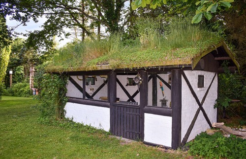 Skivarp House | Look forward to your lovely vacation home with lush grounds extending to the sea.
