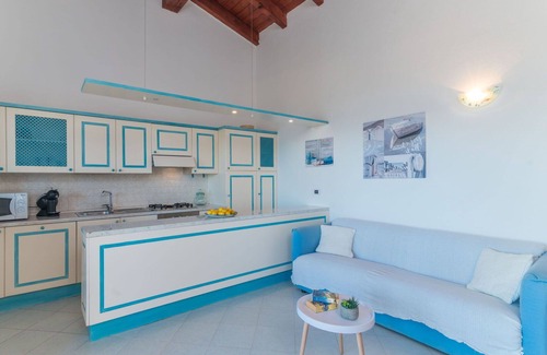 Porto Pozzo Apartment | Lovely apartment for 4 guests with WIFI, A/C, TV, terrace and parking