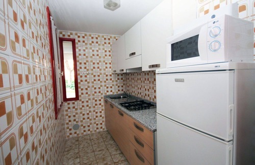 Lignano Pineta House | Lovely apartment in villa for 8 people with A/C, WIFI, pool, TV, patio and pets allowed