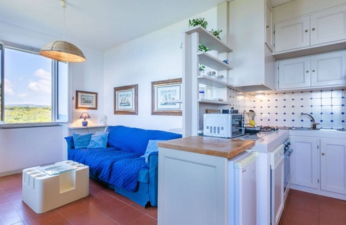 Rosignano Marittimo Apartment | Lovely apartment for 7 guests with pool, WIFI, TV and patio