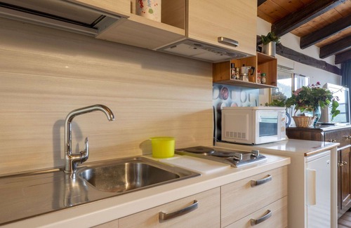 Vito d'Asio Apartment | Lovely apartment for 2 people with A/C, pool, WIFI, TV, patio, pets allowed and parking