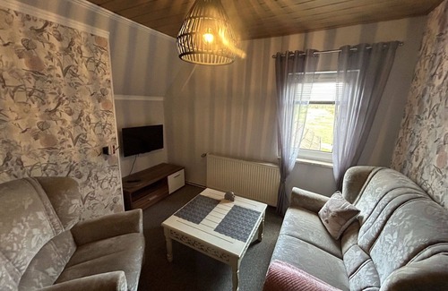 Großheide Apartment | Lovely apartment for 4 people with WIFI, TV, terrace, pets allowed and parking