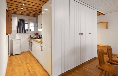 Davos-Dorf Apartment | Lovely apartment for 4 guests with WIFI, pool, TV and balcony