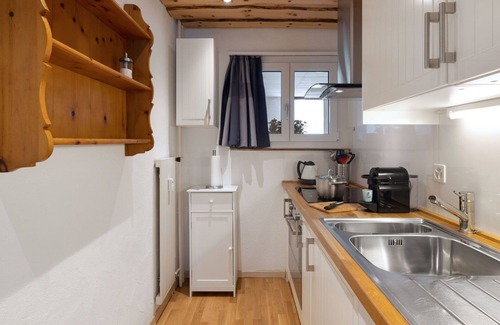 Davos-Dorf Apartment | Lovely apartment for 4 guests with WIFI, pool, TV and balcony