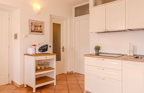 Dongo Apartment | Lovely apartment for 4 people with A/C, pool, WIFI, TV, terrace and parking