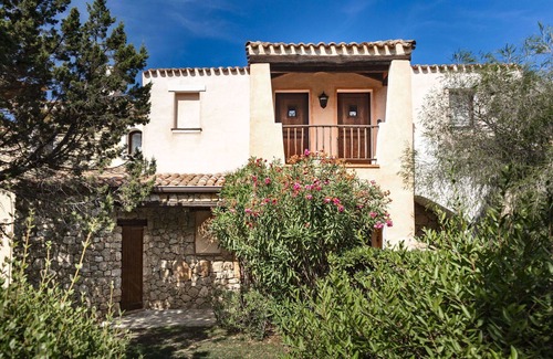 Liscia di Vacca Apartment | Lovely apartment for 4 people with WIFI, pool, A/C, TV, terrace, pets allowed and parking