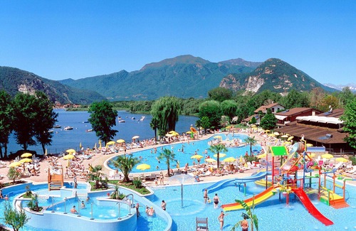 Fondotoce Apartment | Lovely apartment for 7 people with WIFI, pool, TV, balcony and parking