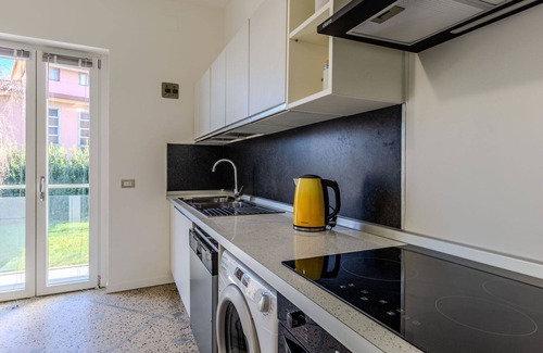 Dervio Villa | Lovely apartment in villa for 12 guests with WIFI, A/C, TV, patio, pets allowed and parking