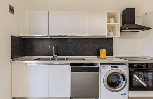 Dervio Villa | Lovely apartment in villa for 12 guests with WIFI, A/C, TV, patio, pets allowed and parking