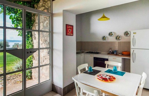 Bolsena Apartment | Lovely apartment for 6 people with WIFI, pool, TV, patio and pets allowed