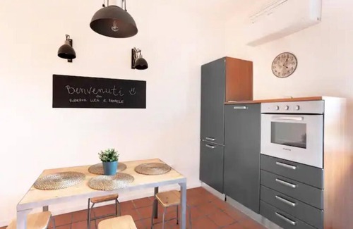Ancona Condo | Lovely apartment with fireplace station area
