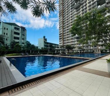 Project 4 House | Lovely Elegant 2BR Condo with Pool Access at Infina Cubao QC