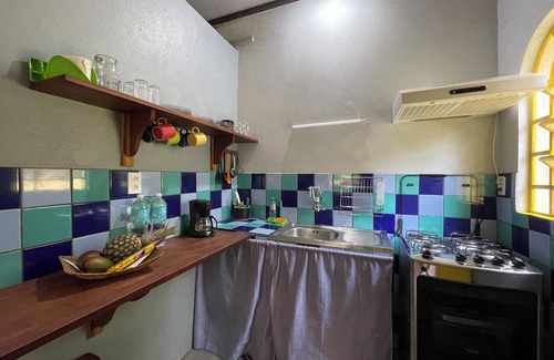 Paraty Cottage | Lovely little house in the woods, birds, trails and waterfall in the backyard.