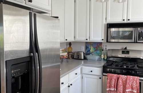 Shelter Cove House | Lush, cozy cottage with ocean views