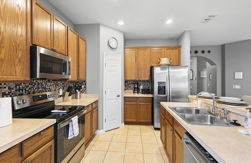 Trafalgar Village Villa | Lux 4BRVilla w/Hot Tub&Grill -Private Heated Pool