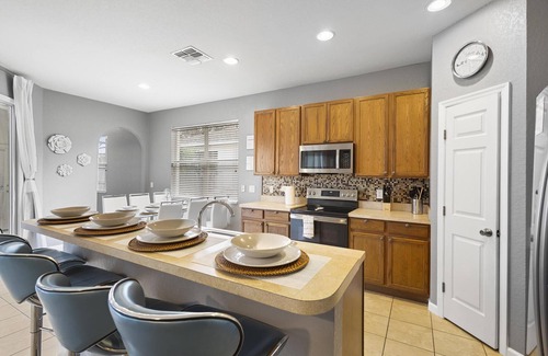 Trafalgar Village Villa | Lux 4BRVilla w/Hot Tub&Grill -Private Heated Pool