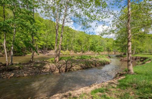 Lansing House | Lux Riverfront Retreat- Hot Tub, Game Room, Views!