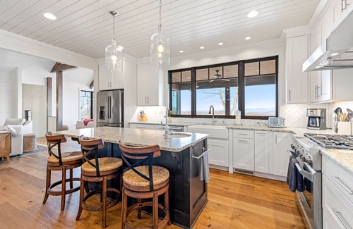 Laurel Park House | Luxe mountain-view retreat with private hot tub, covered deck, & chef's kitchen