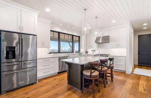 Laurel Park House | Luxe mountain-view retreat with private hot tub, covered deck, & chef's kitchen