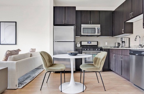Assembly Square Apartment | Luxe studio w/W/D, Gym, Rooftop. Steps from T stop by Blueground
