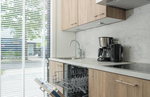 Zeewolde House | Luxurious 4-person house on the water with modern kitchen, direct access to the water and comfortable furnishings. Perfect for rest and relaxation!
