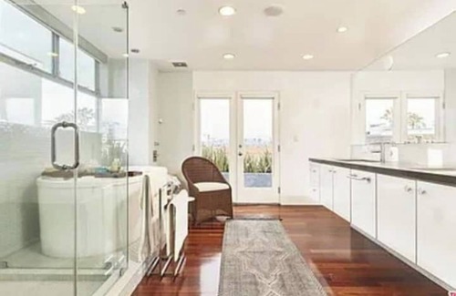 Marina Peninsula House | Luxurious Coastal Retreat Steps from Beach & Canal