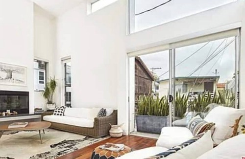 Marina Peninsula House | Luxurious Coastal Retreat Steps from Beach & Canal