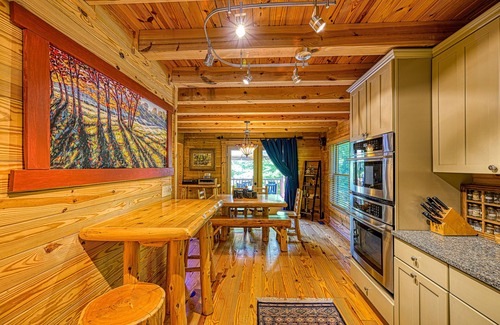 Bumpass Cabin | Luxurious lakefront cabin with hot tub, game room, & washer/dryer- dog friendly