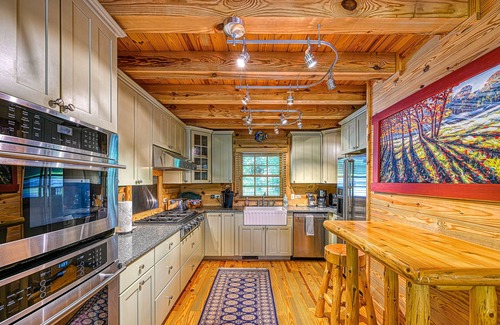 Bumpass Cabin | Luxurious lakefront cabin with hot tub, game room, & washer/dryer- dog friendly